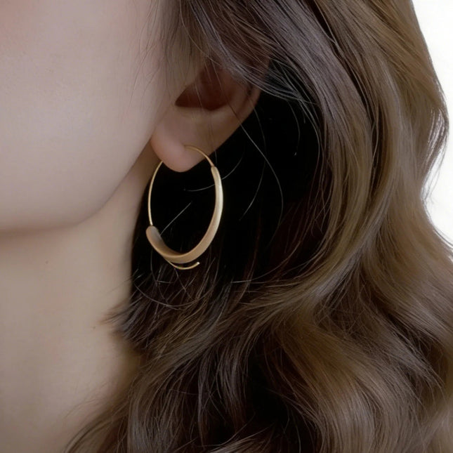 Gold Hoop Earrings with Frosted Texture – Minimalist Winter Design